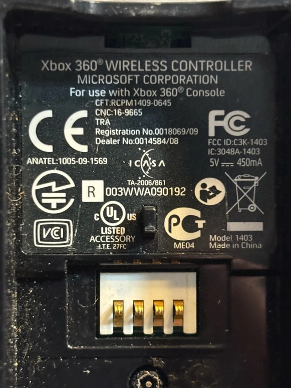 Microsoft Black Xbox 360 Wireless Controller with Colored Face Buttons.